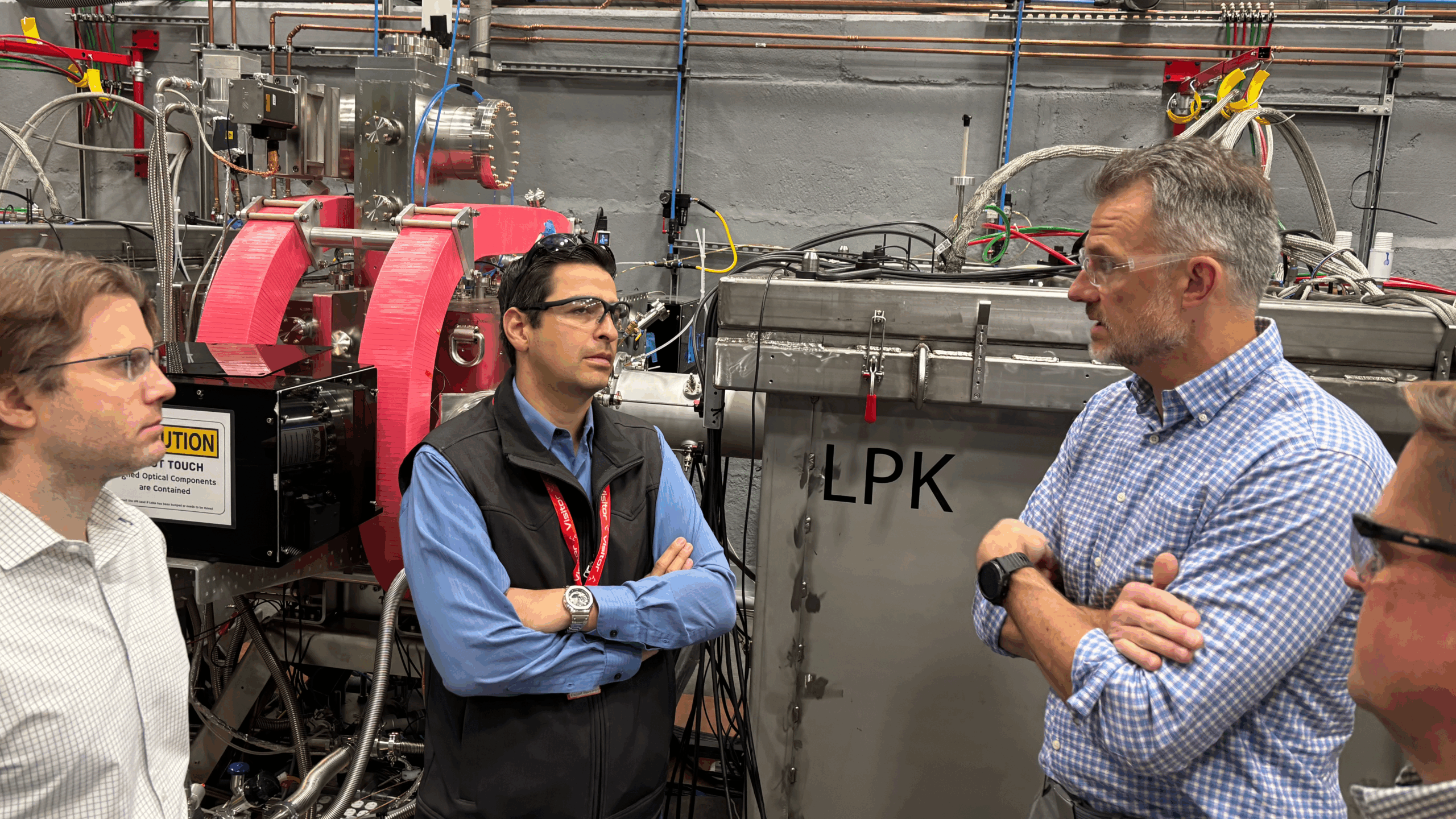 Photo: Brian Boggs, Conner Galloway, and Mike Lynch lead Congressman Gabe Evans on a tour of Xcimer’s Phoenix Facility.